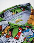 Pins and Aces TMNT Youth Comic Strip Short Sleeve Polo